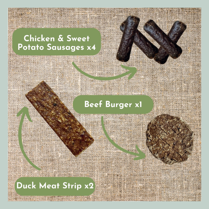 Chicken sausages, beef burger and duck meat strip from a natural and healthy treats box of chews for dogs that are old, senior or aging.