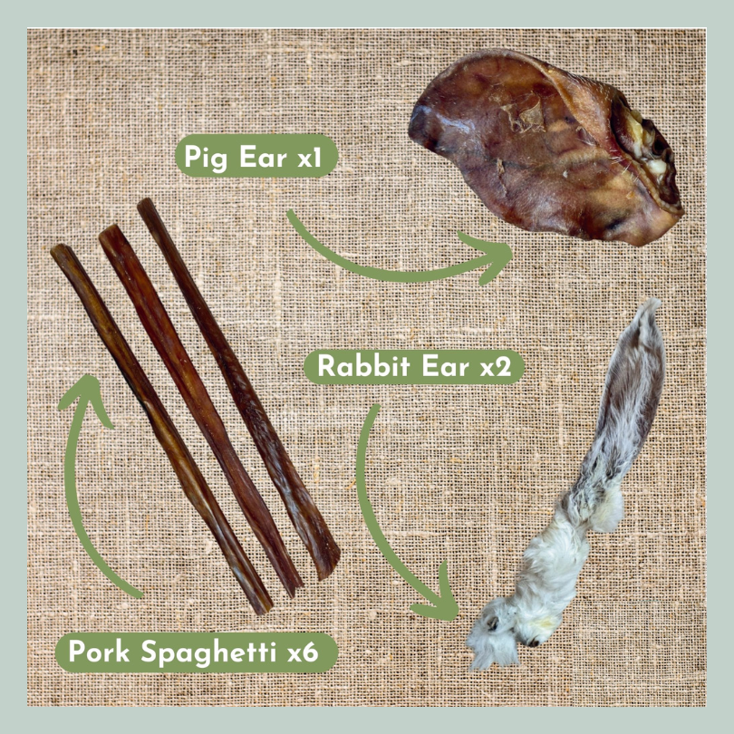 Pigs ear, rabbit ears and pork spaghetti from a hypoallergenic allergy control natural healthy treat box for dogs and puppies