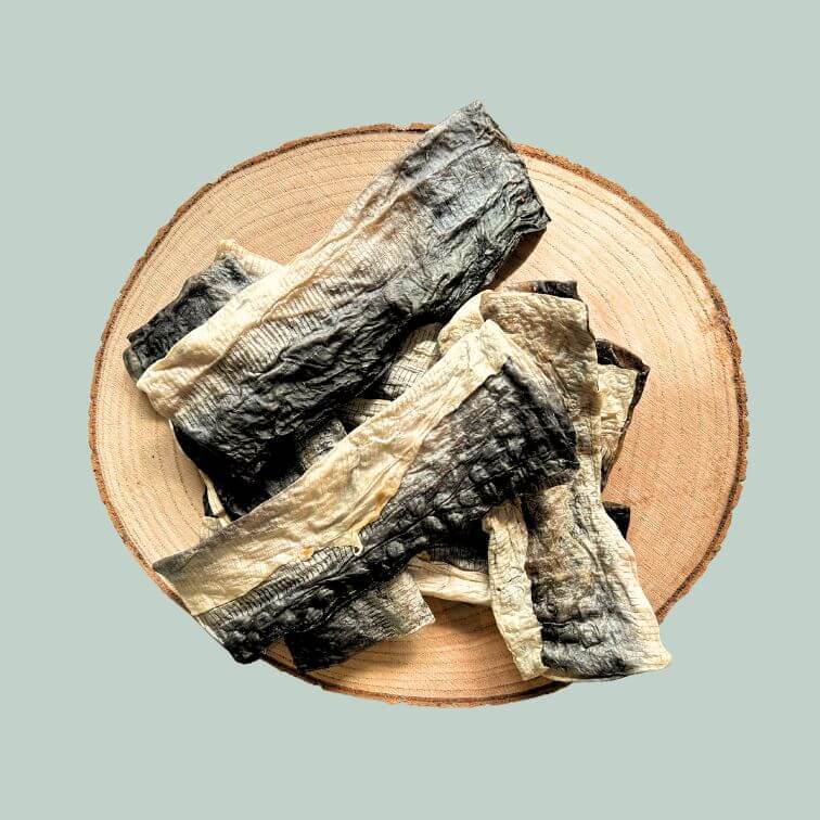 Pile of dried fish skin flatties on a plate