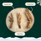 A dried chicken foot, duck foot, and goose foot dog treat on a wooden slice plate against a starry green backdrop. The image shows the size comparison between the different dog chews.