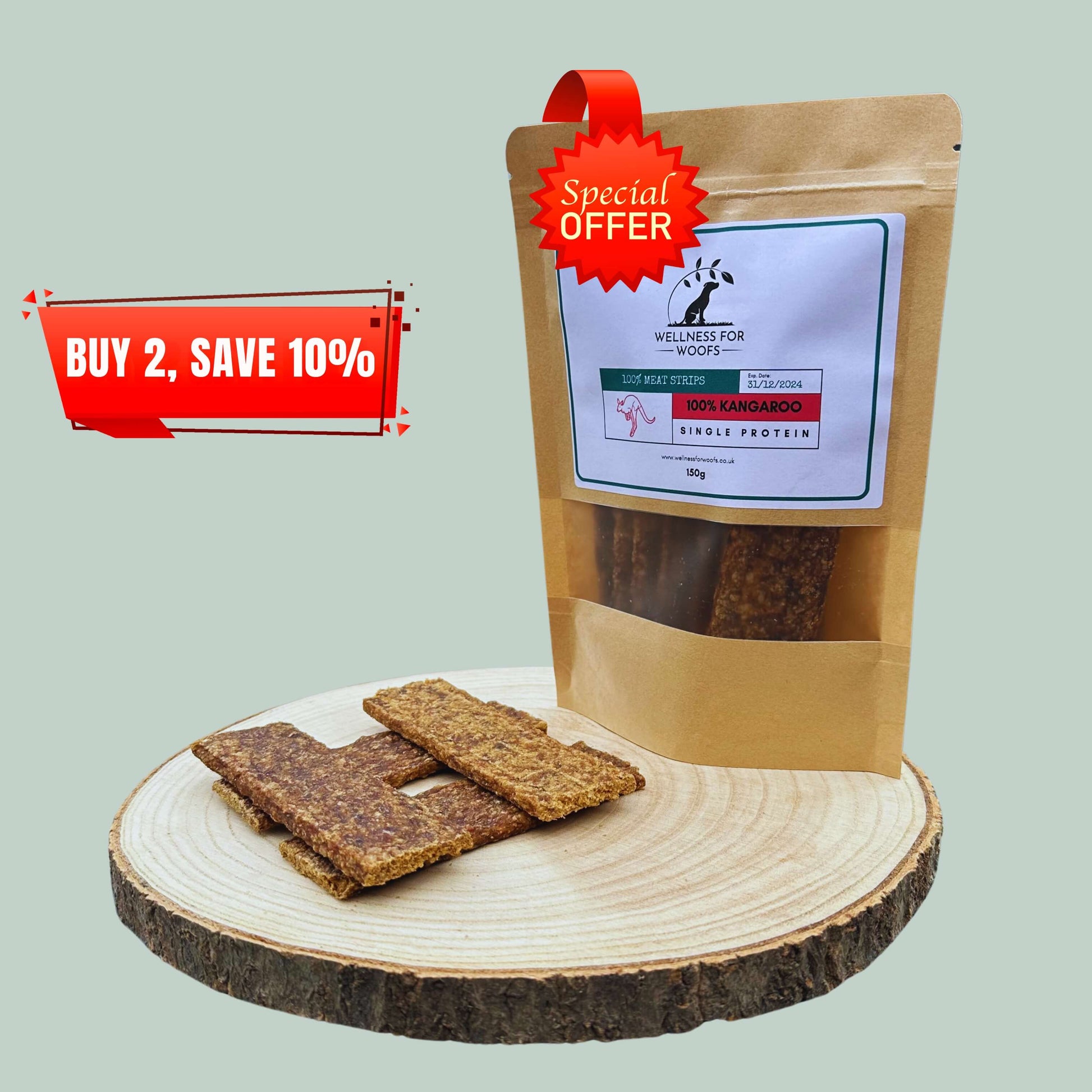 Pouch of kangaroo meat strip dog treats on a wooden plate, also holding four loose meat strips