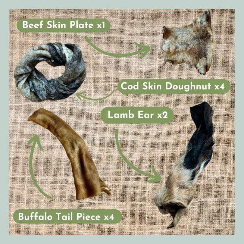 Beef skin plate, cod skin doughnuts, furry lamb ears and buffalo tail pieces from a natural and healthy box of low fat treats and chews for dogs and puppies
