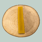 Mango yak bar on a wooden circular platform with a light blue background