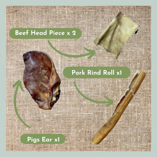 Beef head pieces, pork rind roll and pigs ears from a natural treat box for dogs with sensitive stomachs