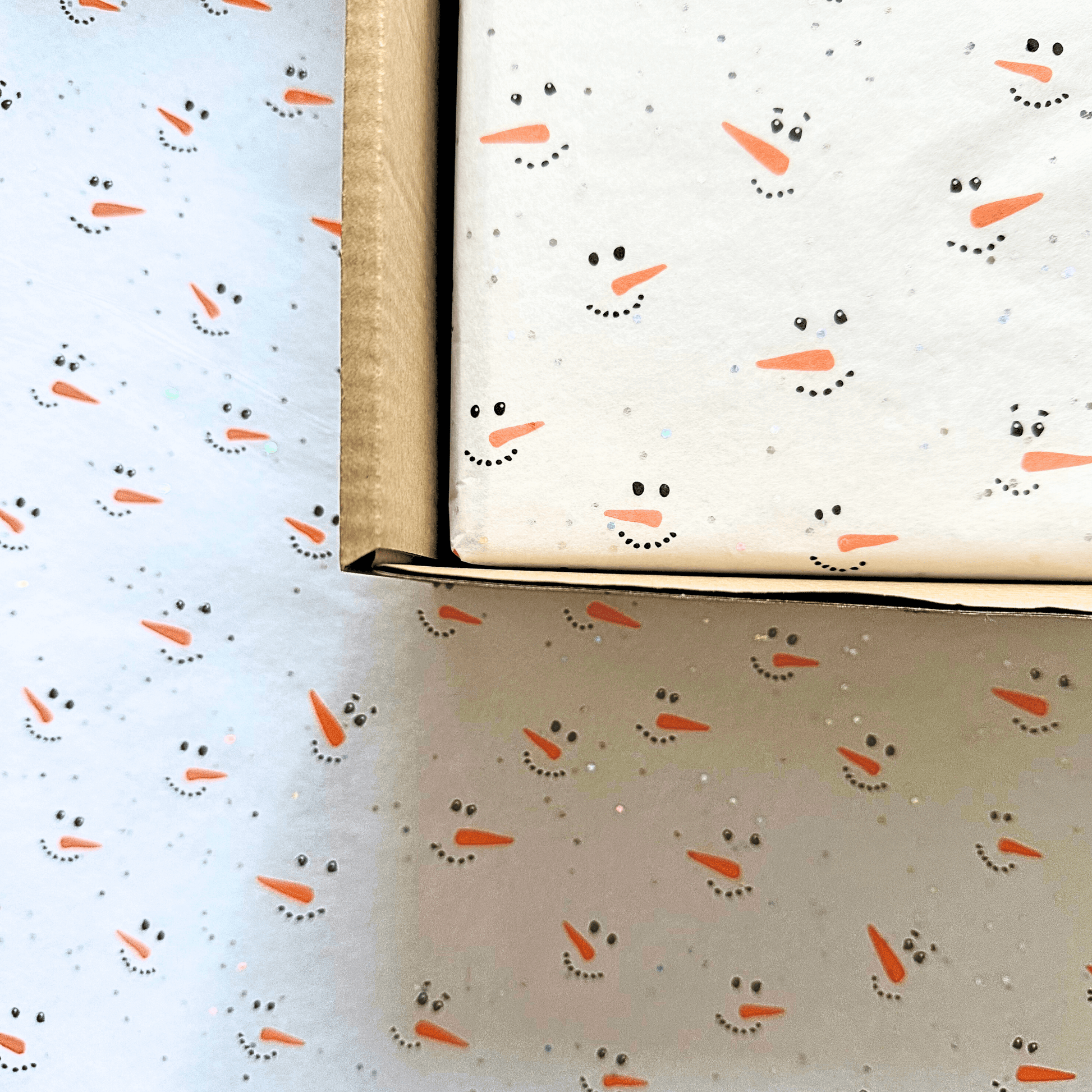 Snowman themed tissue paper for a Christmas Natural dog treat box