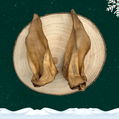 Two venison ear dog treats.